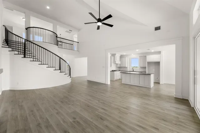 a view of kitchen with furniture and wooden floor