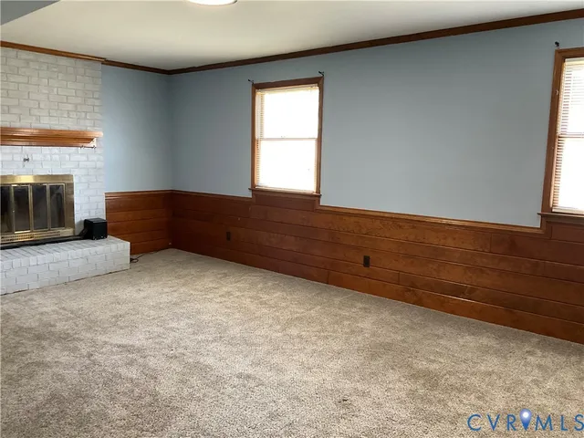 a bathroom with a bathtub and a window