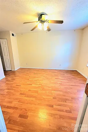 a view of a room with an empty space