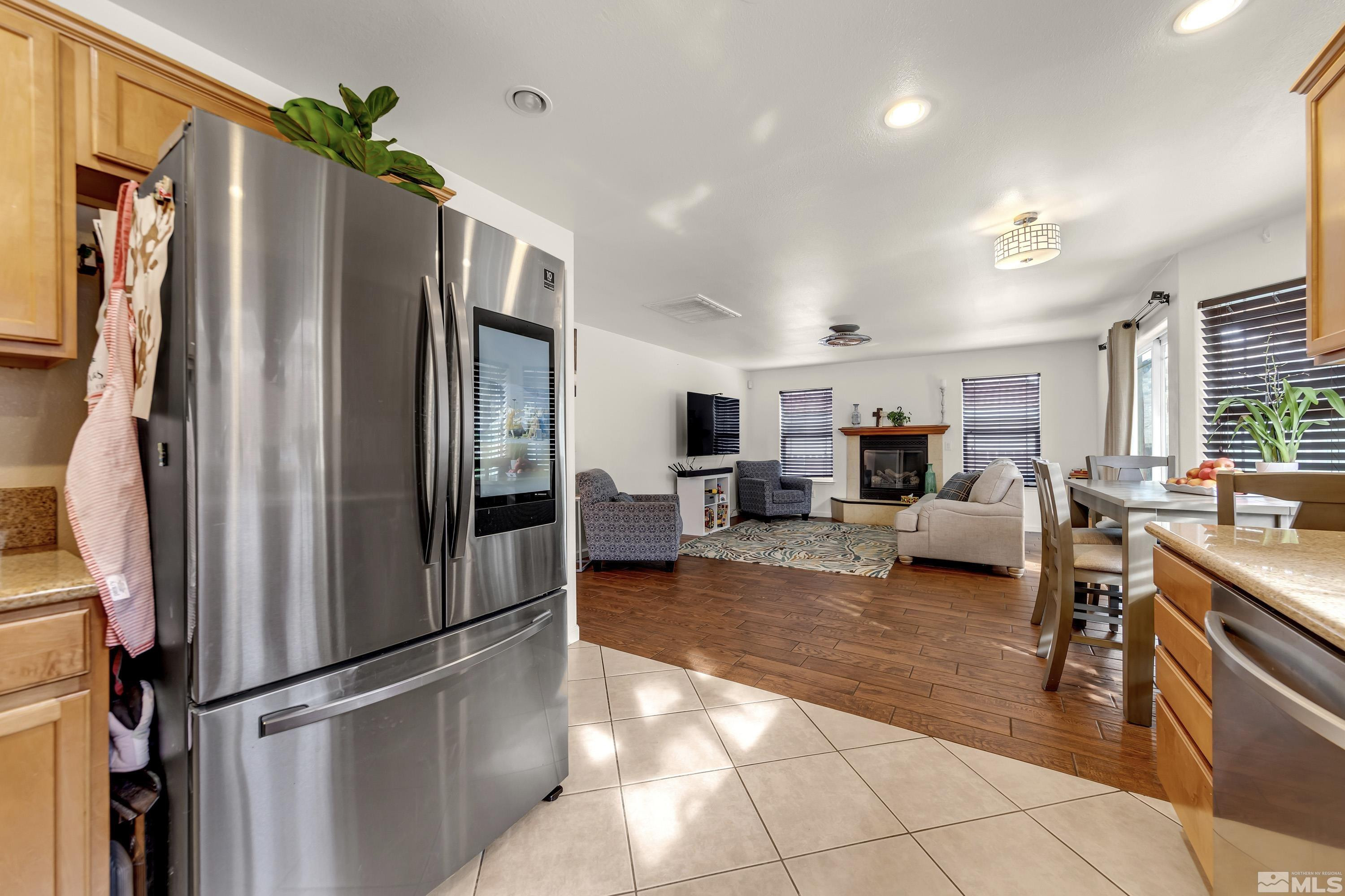 6750 Peppermint Court Reno, NV 89506 - Photo 15 of 33 a living room with stainless steel appliances furniture and a kitchen view