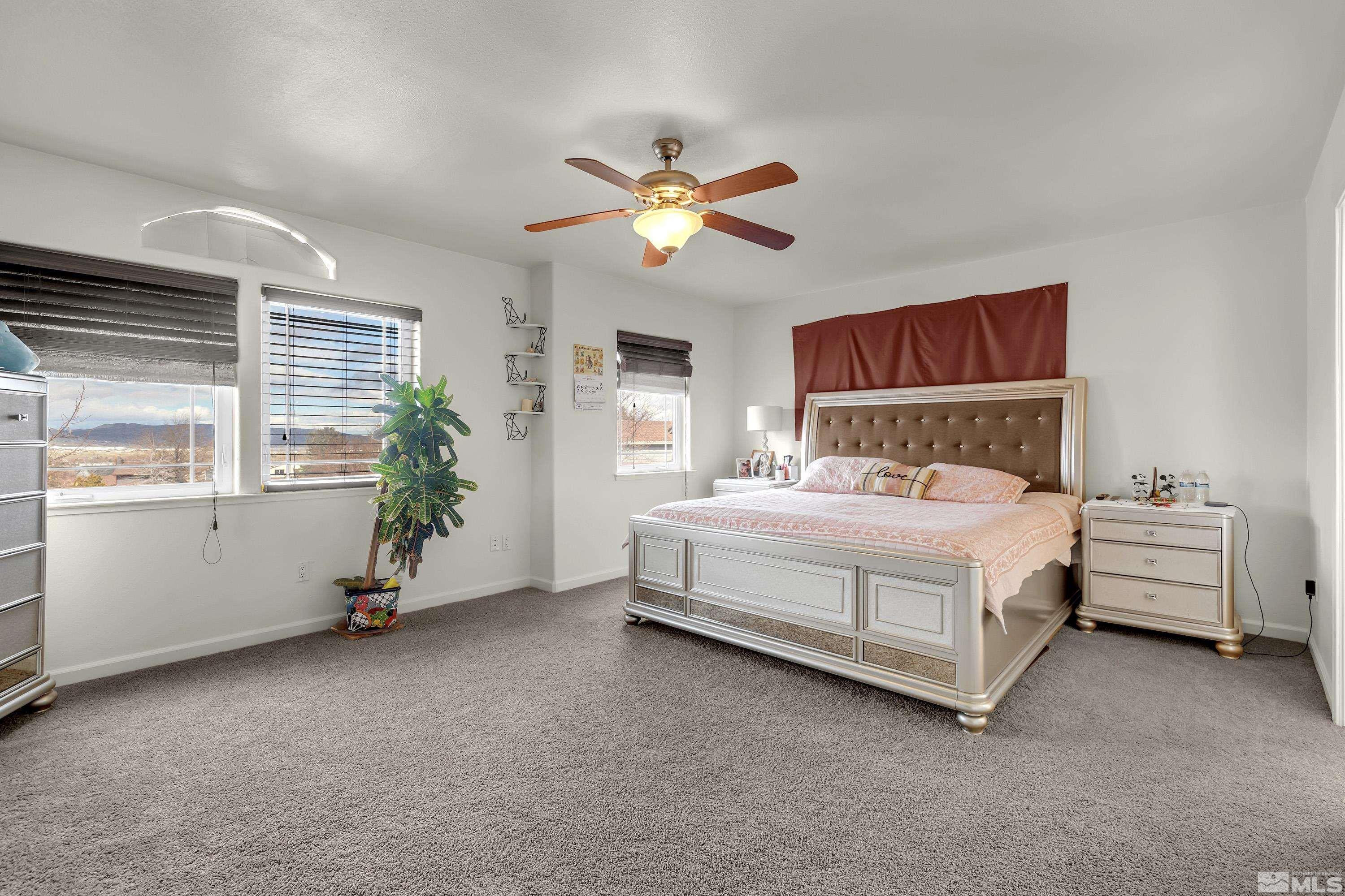 6750 Peppermint Court Reno, NV 89506 - Photo 20 of 33 a bedroom with a bed and a window