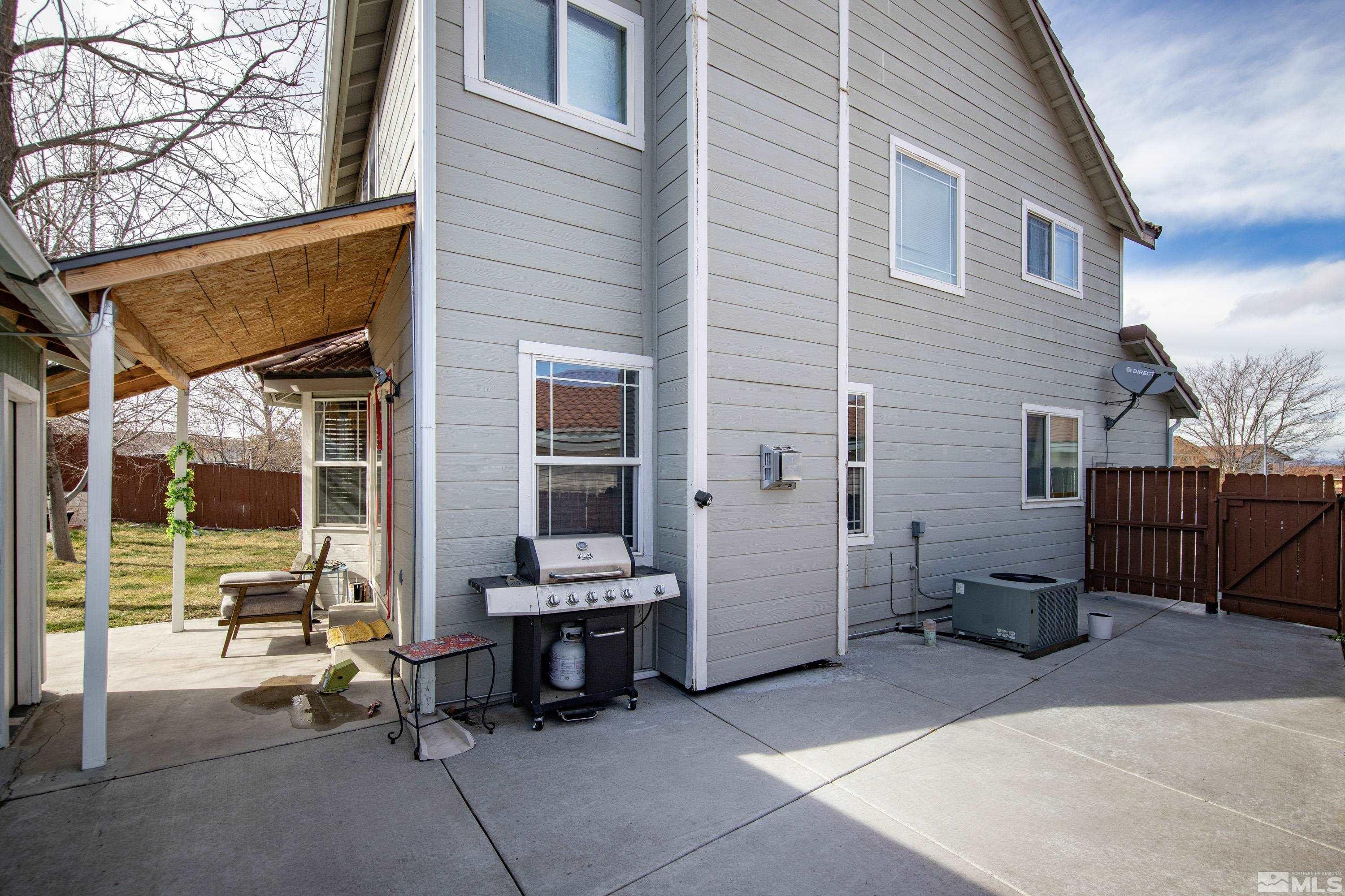 6750 Peppermint Court Reno, NV 89506 - Photo 26 of 33 a view of backyard with outdoor seating