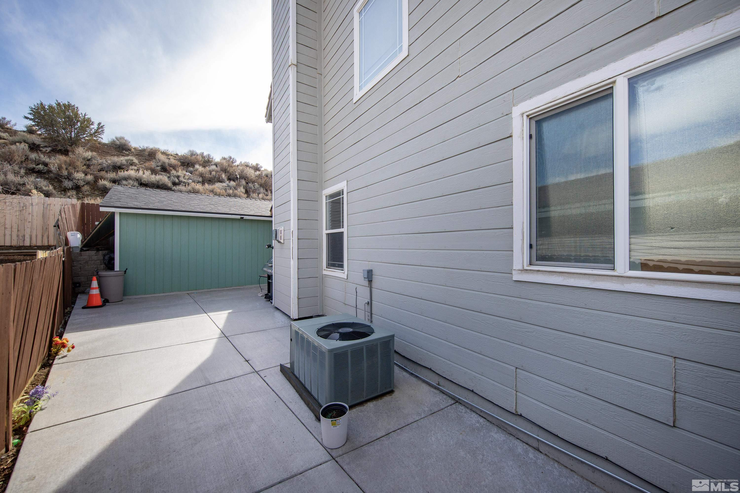 6750 Peppermint Court Reno, NV 89506 - Photo 27 of 33 a view of a door and chair and tables in the balcony