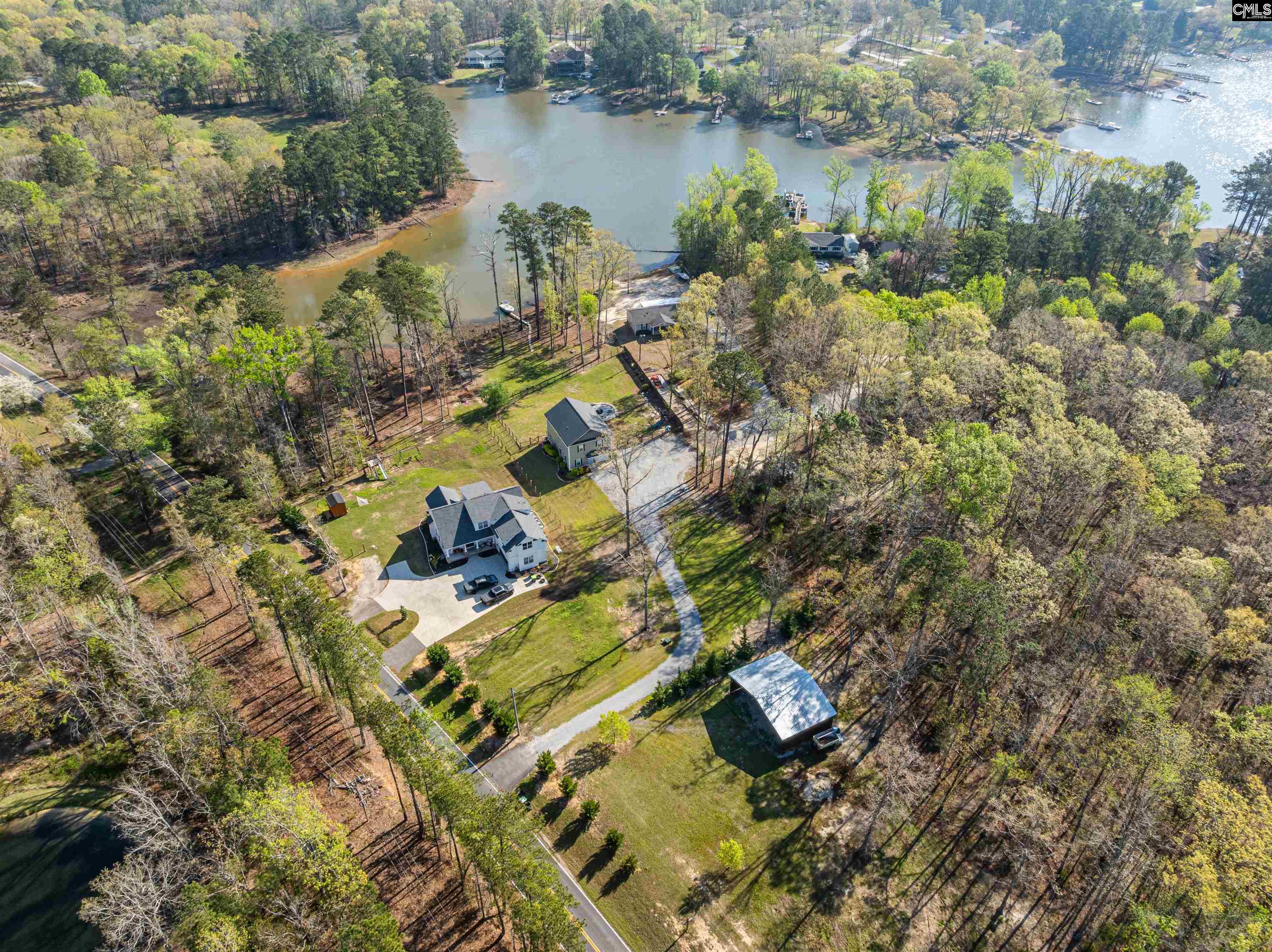 649 Sandbar Road Chapin, SC 29036 - Photo 6 of 40 an aerial view of residential houses with outdoor space