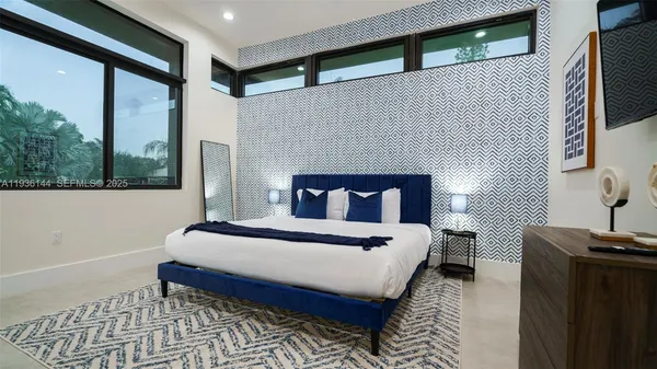 a view of a house with swimming pool and porch