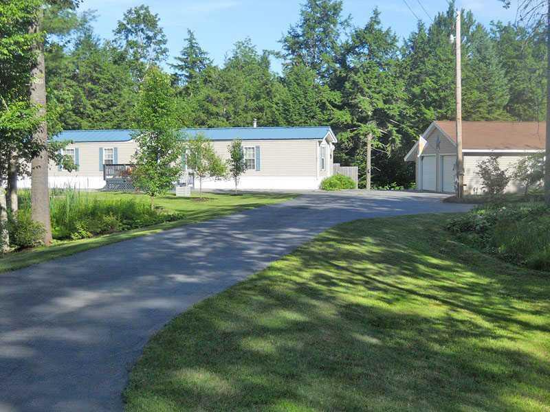 696 Tate Road Corinth, ME 04427 - Photo 35 of 35 Exterior Front. View from street. ...