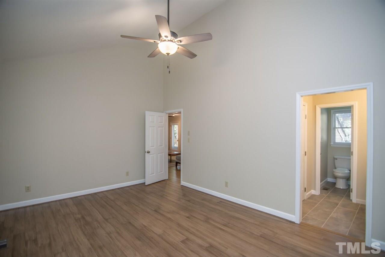 109 Boxford Road Morrisville, NC 27560 - Photo 14 of 27 a view of a livingroom with wooden floor