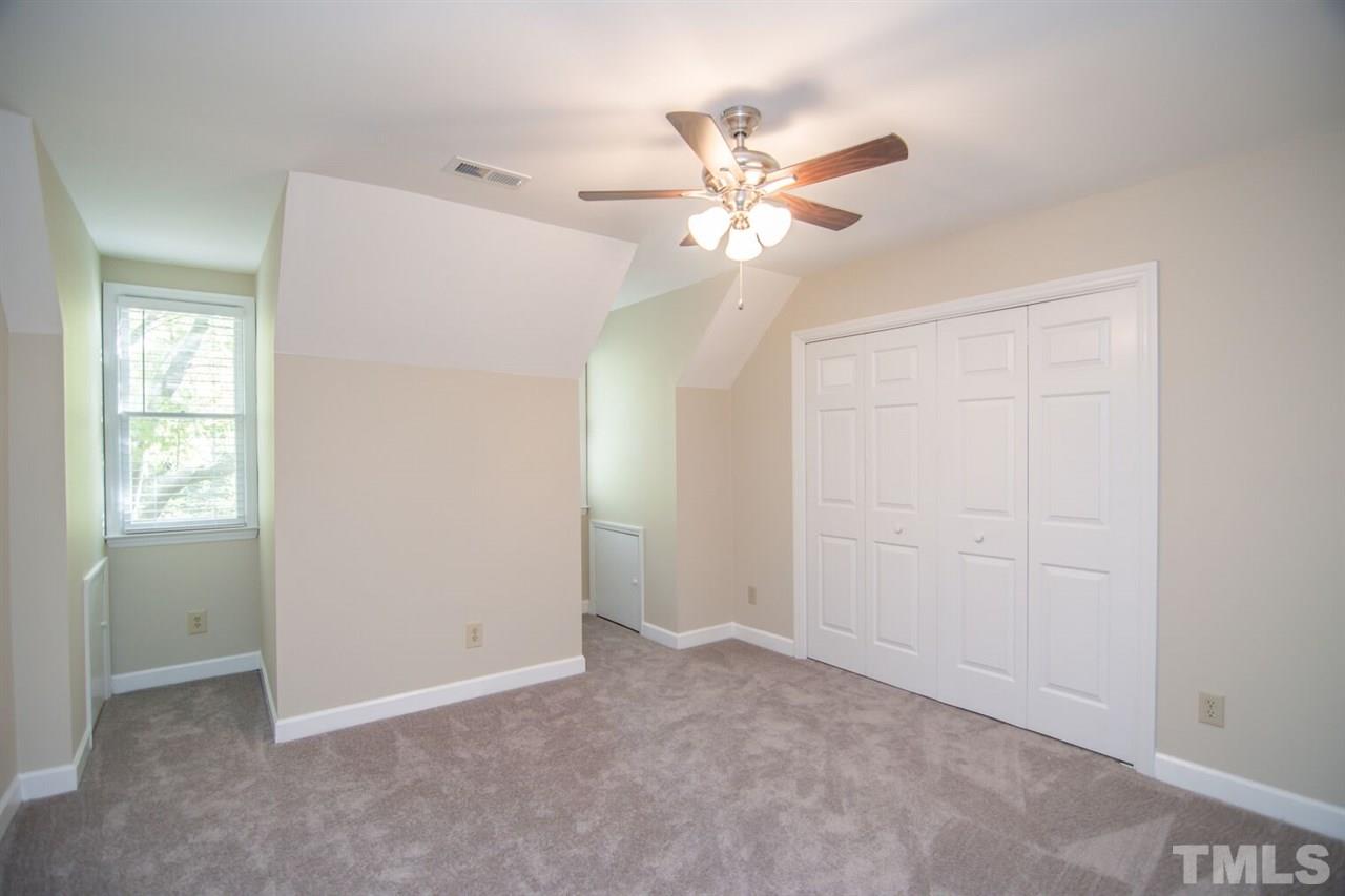 109 Boxford Road Morrisville, NC 27560 - Photo 18 of 27 a view of an empty room with a window