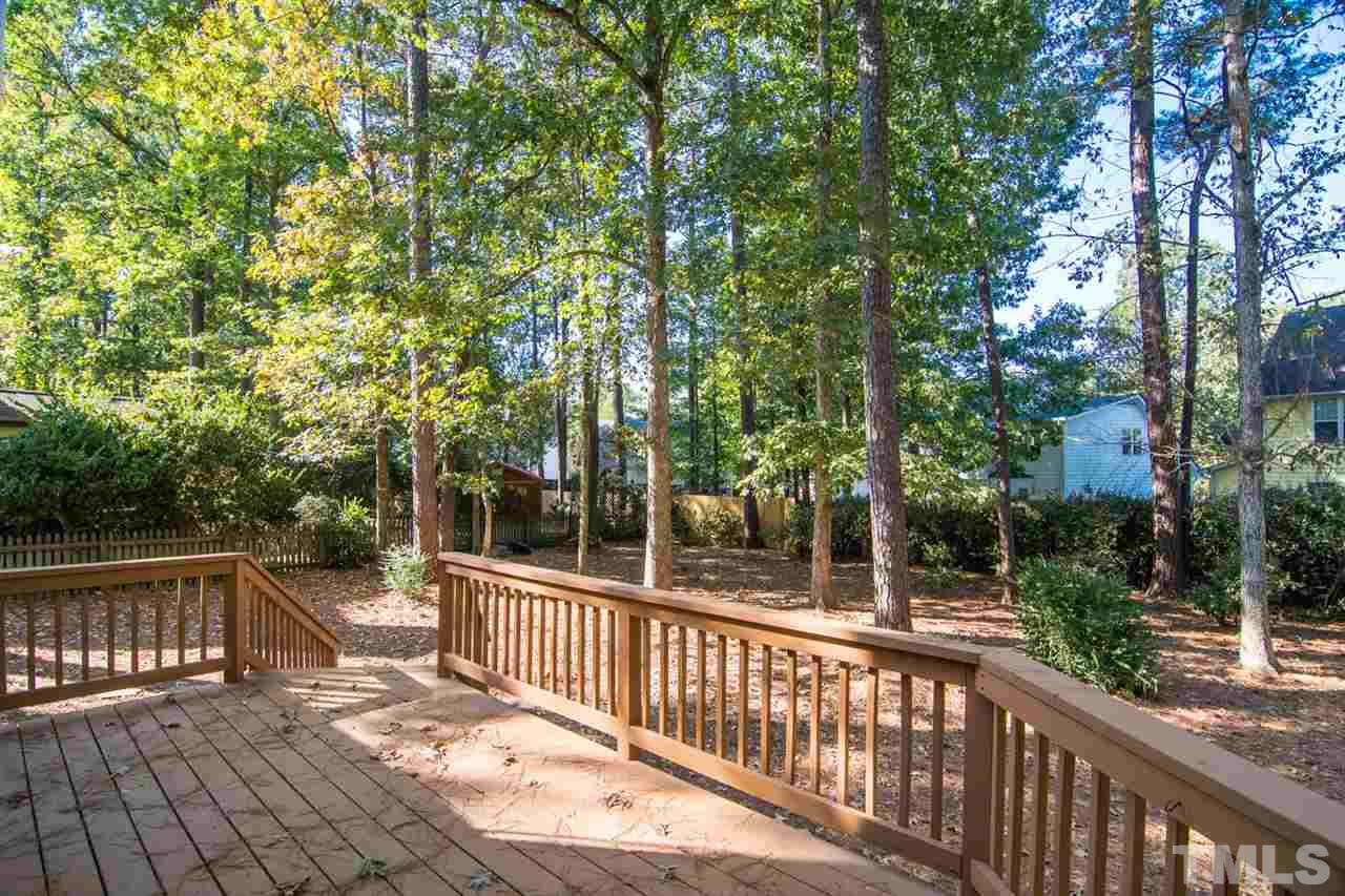 109 Boxford Road Morrisville, NC 27560 - Photo 25 of 27 a view of a wooden fence and trees