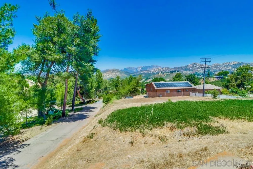 530 Mountain View Road El Cajon, CA 92021 - Photo 17 of 18 a front view of a house with a yard