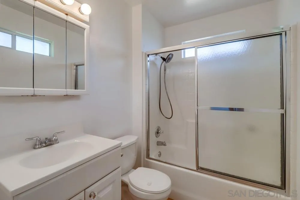 530 Mountain View Road El Cajon, CA 92021 - Photo 10 of 18 a bathroom with a sink toilet and shower