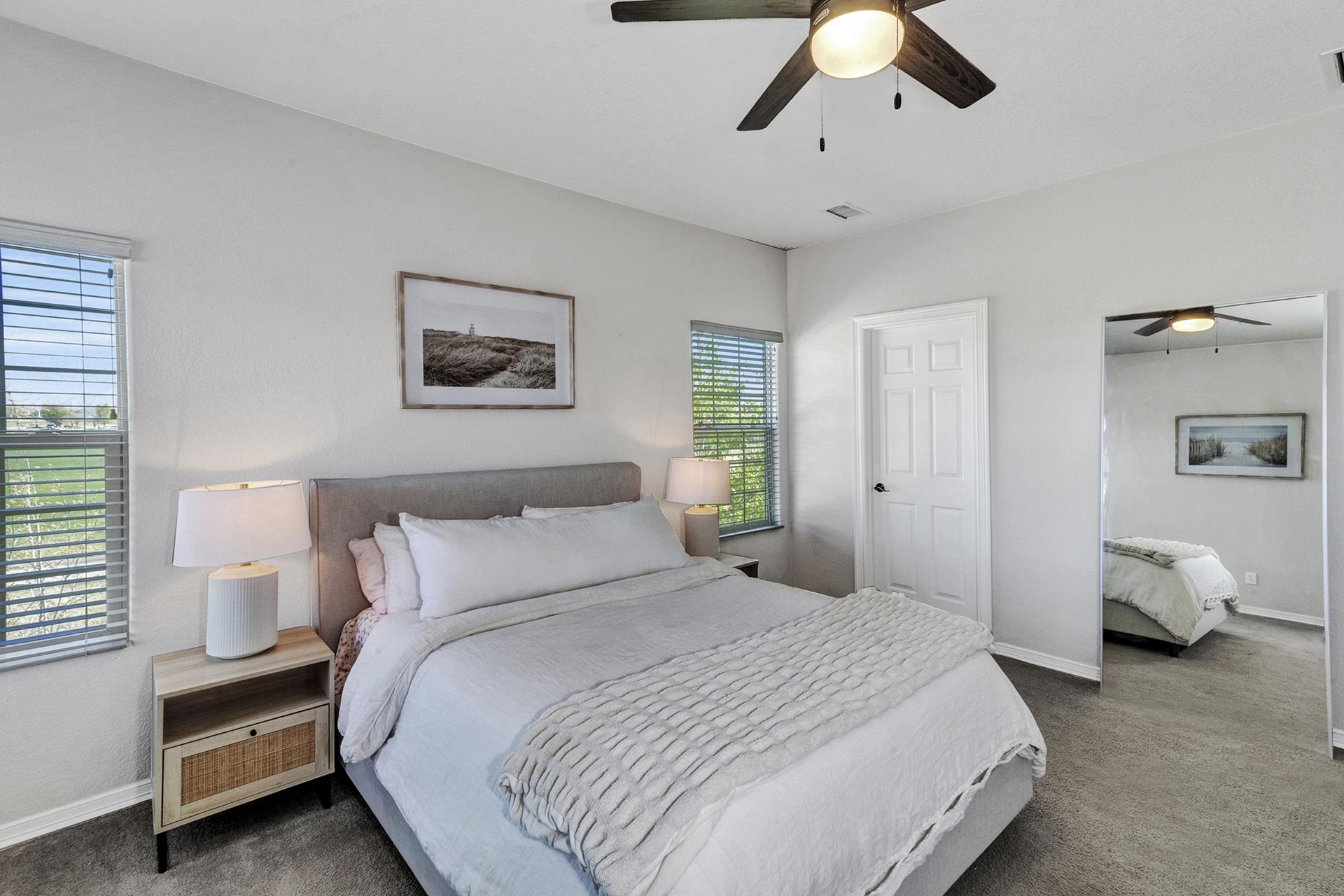2432 Jack Creek Road Grand Junction, CO 81505 - Photo 21 of 26 a bedroom with bed and window