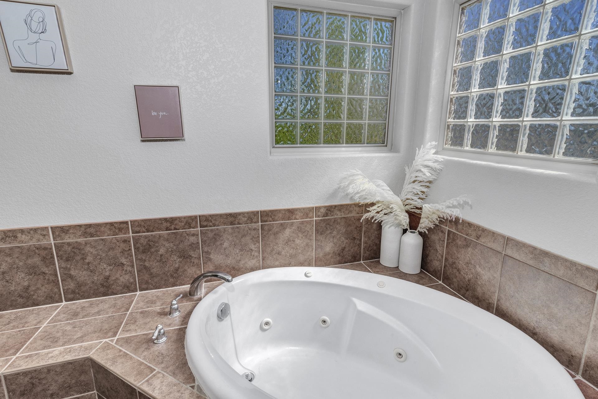 2432 Jack Creek Road Grand Junction, CO 81505 - Photo 23 of 26 a bathroom with a bathtub