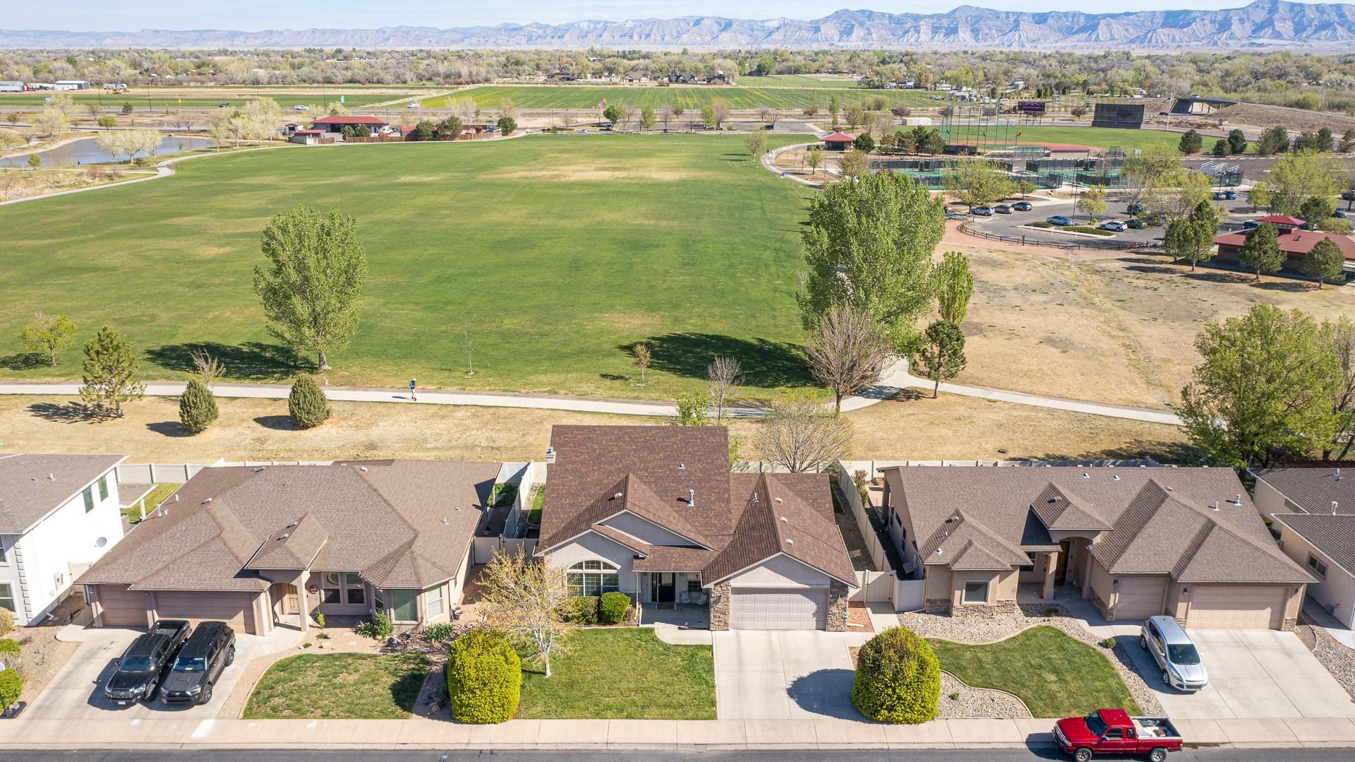 2432 Jack Creek Road Grand Junction, CO 81505 - Photo 4 of 26 an aerial view of residential houses with outdoor space