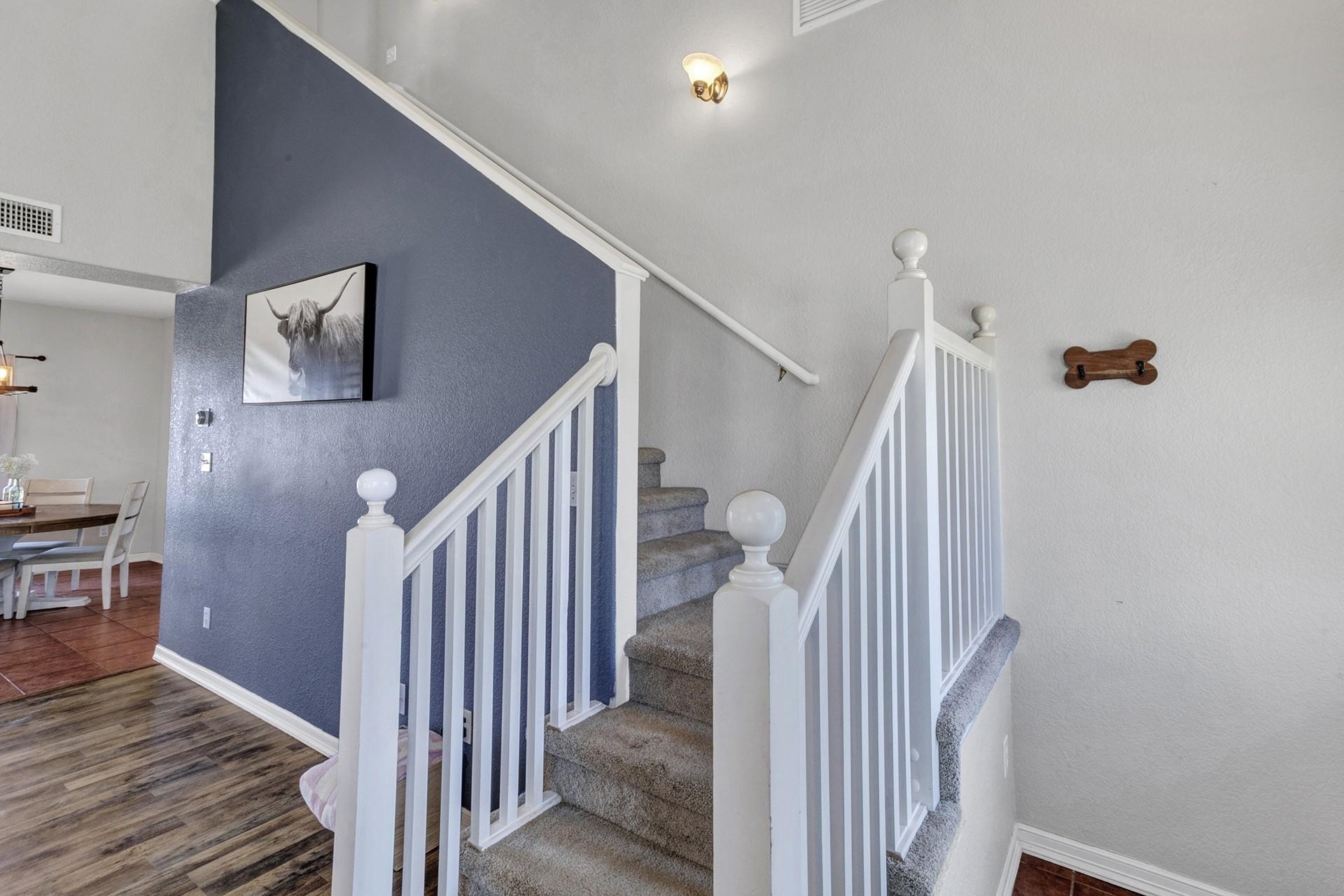 2432 Jack Creek Road Grand Junction, CO 81505 - Photo 6 of 26 a view of a hallway with staircase