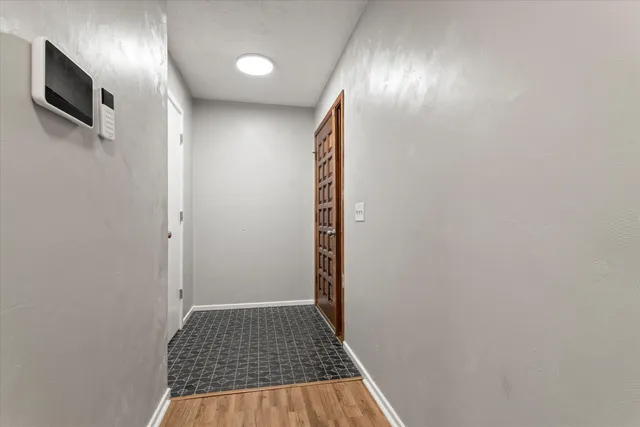 a view of a livingroom with wooden floor