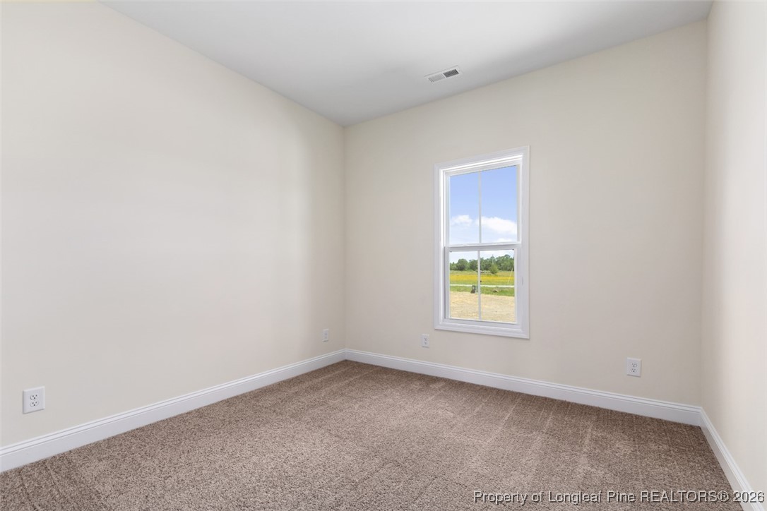111 Merle Road Pinebluff, NC 28373 - Photo 25 of 32 an empty room with window