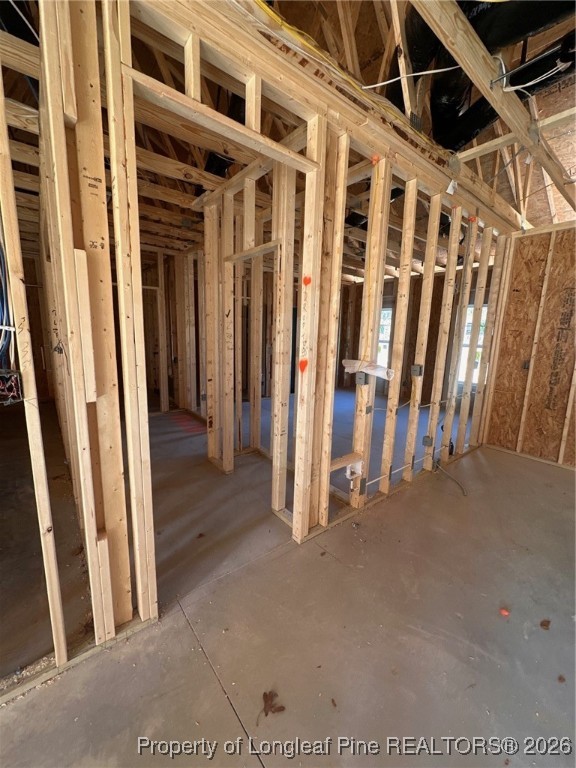 111 Merle Road Pinebluff, NC 28373 - Photo 3 of 32 a view of an empty room with wooden floor
