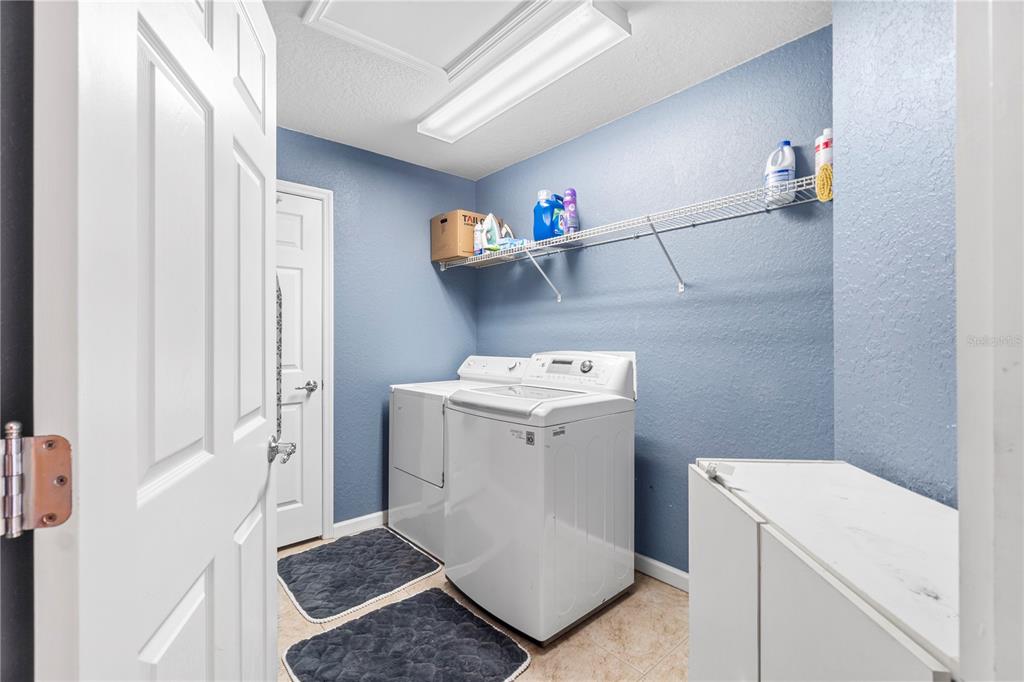 4199 Southwest 46th Court Ocala, FL 34474 - Photo 22 of 50 a utility room with dryer and washer