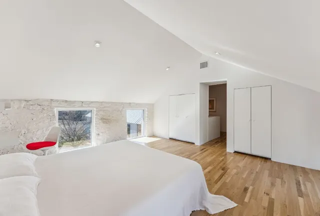 a view of a livingroom with furniture and a couch