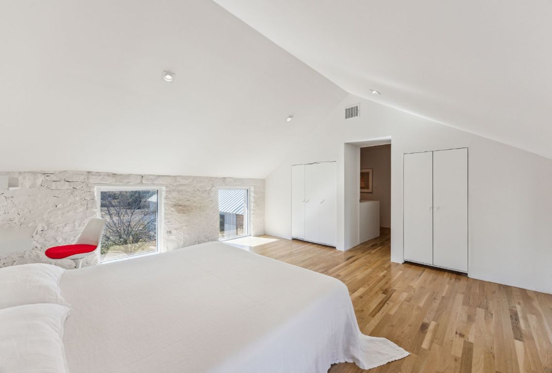 1037 Ranch Road 962 West Round Mountain, TX 78663 - Photo 25 of 40 a bedroom with a bed and a couch