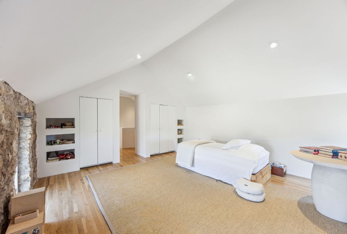 1037 Ranch Road 962 West Round Mountain, TX 78663 - Photo 28 of 40 a bedroom with furniture and white walls