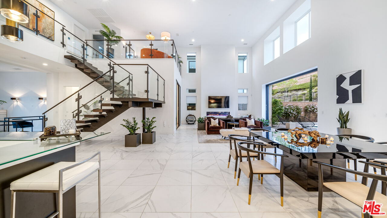 a view of a livingroom and dining room