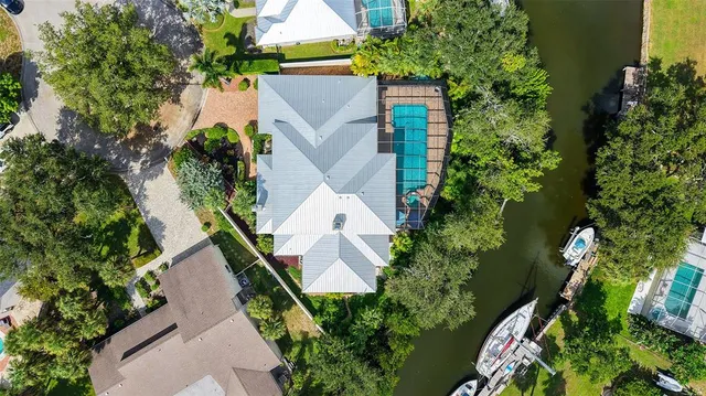 an aerial view of house with yard