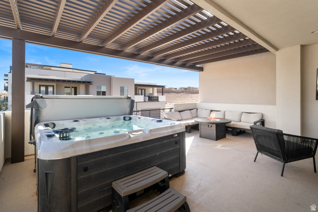 5482 Alice Blue Place St. George, UT 84790 - Photo 28 of 35 Upper patio with fire pit, hot tub, and TV