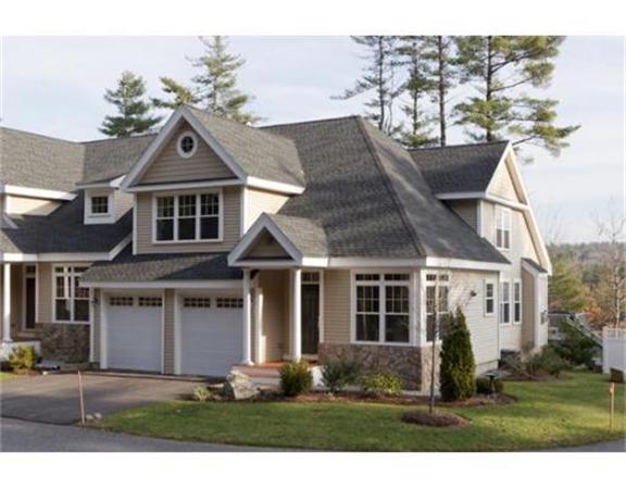 15 D Trail Ridge Way, Unit 52 Harvard, MA 01451 - Photo 1 of 29 a front view of a house with a yard