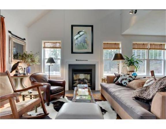 15 D Trail Ridge Way, Unit 52 Harvard, MA 01451 - Photo 11 of 29 a living room with furniture and a fireplace