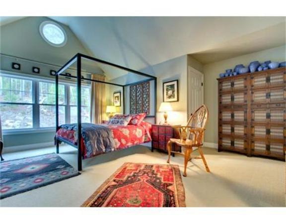 15 D Trail Ridge Way, Unit 52 Harvard, MA 01451 - Photo 18 of 29 a bedroom with furniture and a large window