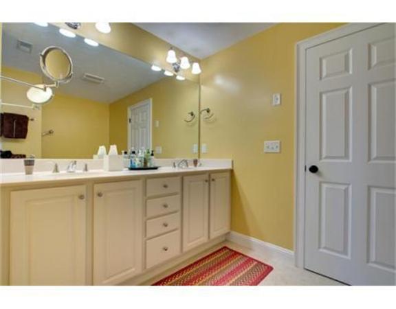 15 D Trail Ridge Way, Unit 52 Harvard, MA 01451 - Photo 19 of 29 a bathroom with a sink and a mirror