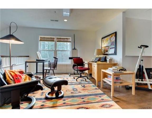 15 D Trail Ridge Way, Unit 52 Harvard, MA 01451 - Photo 20 of 29 a living room with furniture a rug and white walls