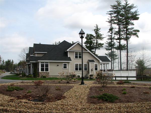 15 D Trail Ridge Way, Unit 52 Harvard, MA 01451 - Photo 2 of 29 a house that has a tree in front of it
