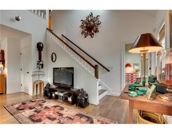 15 D Trail Ridge Way, Unit 52 Harvard, MA 01451 - Photo 21 of 29 a living room with furniture and a flat screen tv