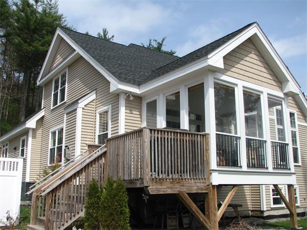 15 D Trail Ridge Way, Unit 52 Harvard, MA 01451 - Photo 3 of 29 a front view of a house with a porch