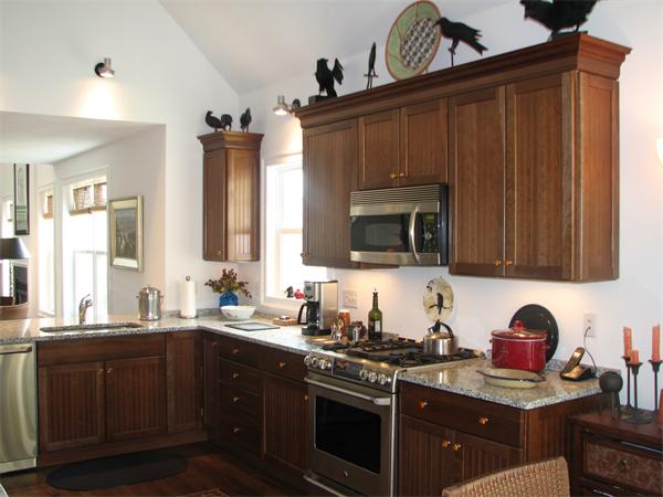 15 D Trail Ridge Way, Unit 52 Harvard, MA 01451 - Photo 8 of 29 a kitchen with a sink stove and microwave