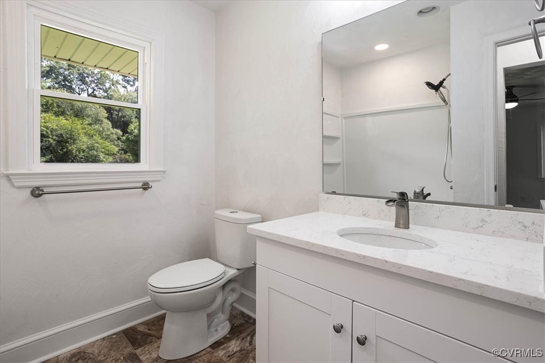 113 Beaver Dam Road Waverly, VA 23890 - Photo 17 of 34 Bathroom with a shower, ceiling fan, vanity, and t