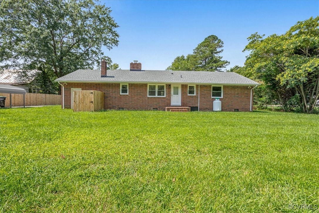 113 Beaver Dam Road Waverly, VA 23890 - Photo 25 of 34 Back of property with a lawn