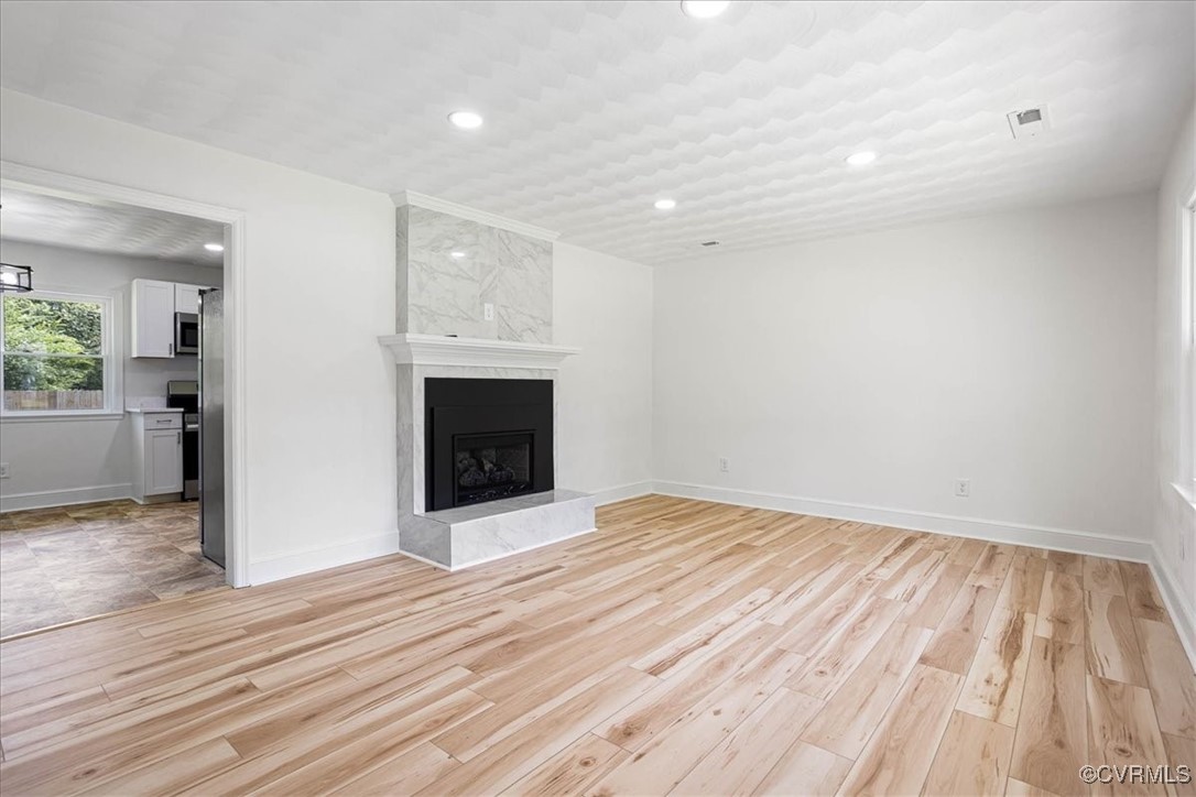 113 Beaver Dam Road Waverly, VA 23890 - Photo 5 of 34 Unfurnished living room featuring light hardwood /