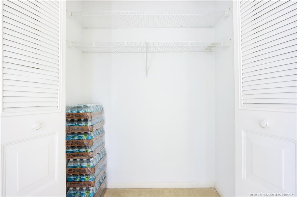 5443 Southeast Miles Grant Road, Unit D205 Stuart, FL 34997 - Photo 27 of 44 Very Large Spare Closet Guest/2nd Bedroom