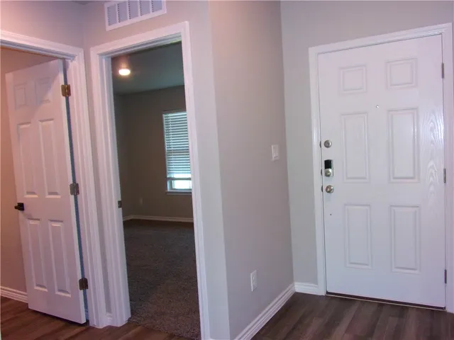 a view of small space with wooden floor