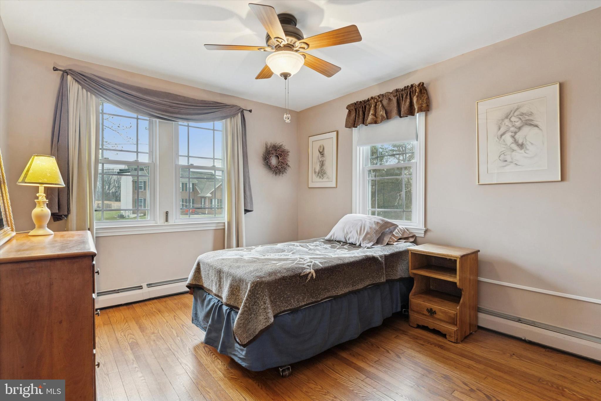 613 Convent Road Aston, PA 19014 - Photo 13 of 25 a bedroom with a bed and a window