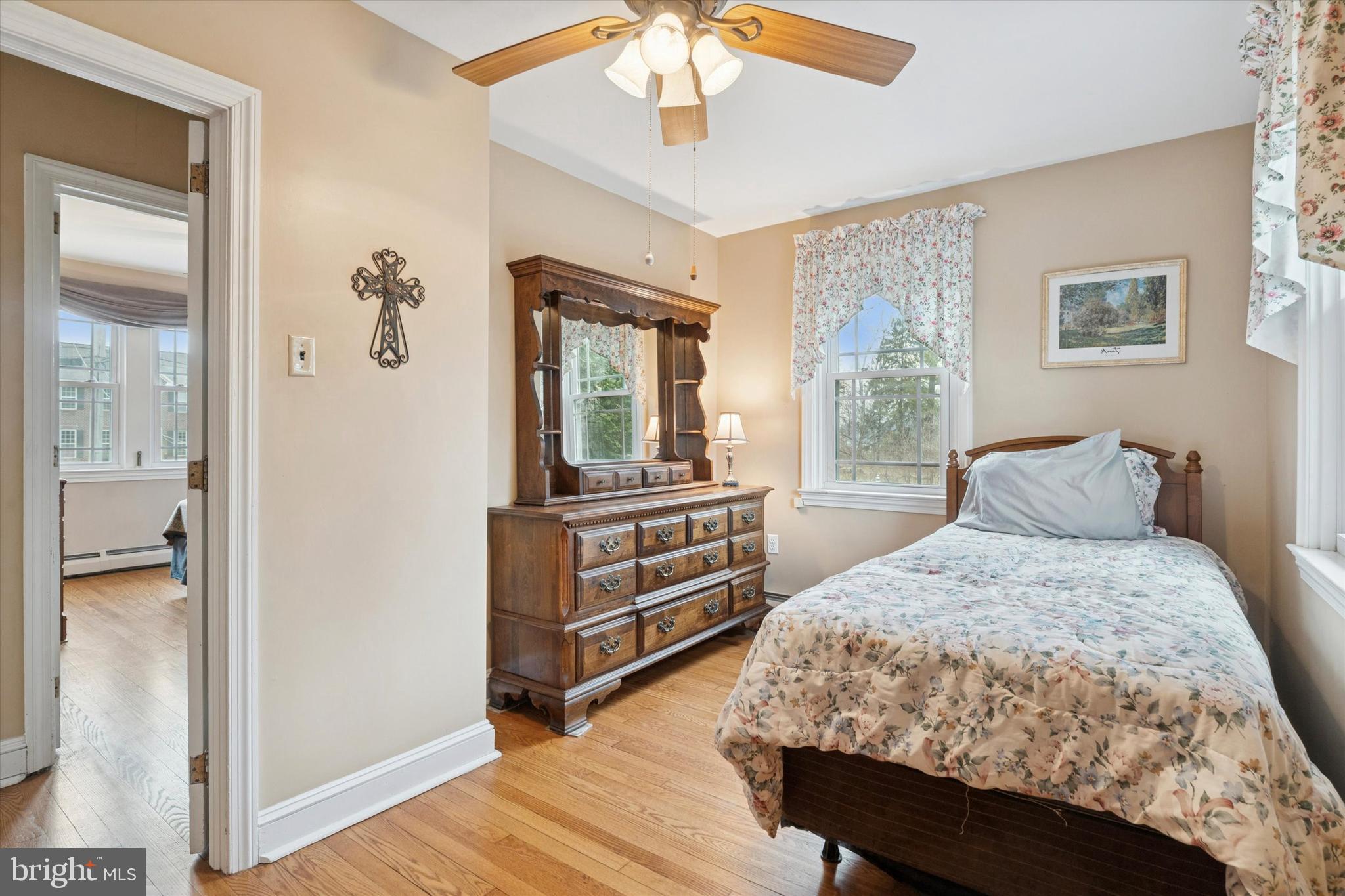 613 Convent Road Aston, PA 19014 - Photo 15 of 25 a bedroom with a large bed and a dresser