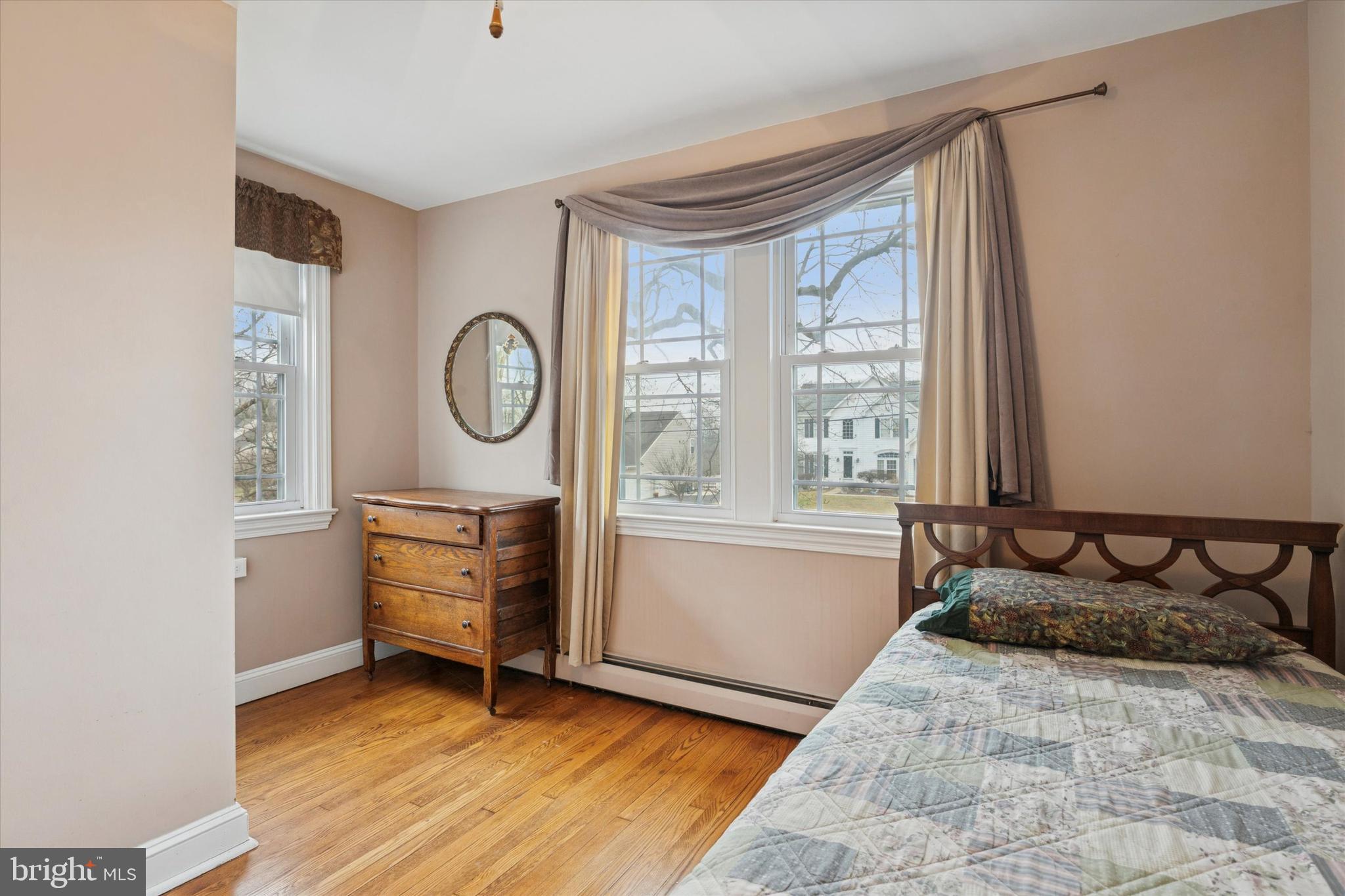 613 Convent Road Aston, PA 19014 - Photo 16 of 25 a bedroom with a bed and a window