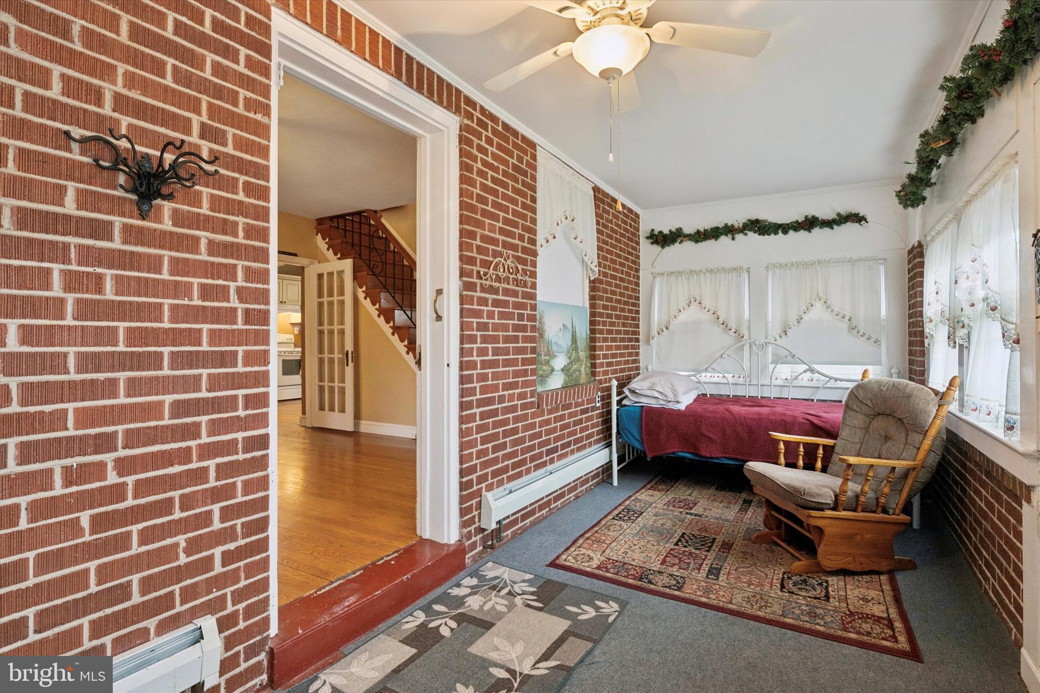 613 Convent Road Aston, PA 19014 - Photo 3 of 25 a outdoor living space with furniture and a rug