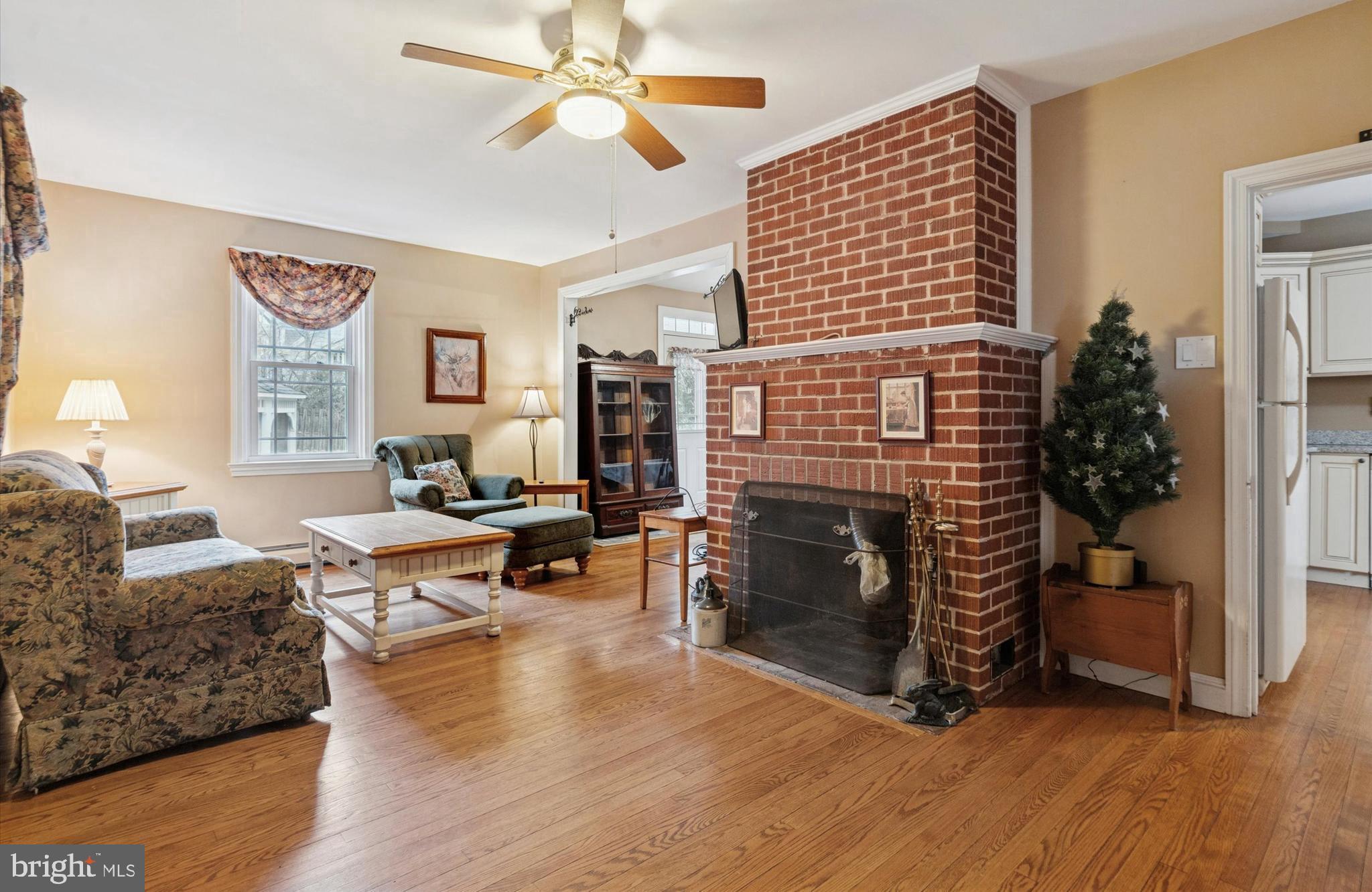 613 Convent Road Aston, PA 19014 - Photo 5 of 25 a living room with furniture and a fireplace