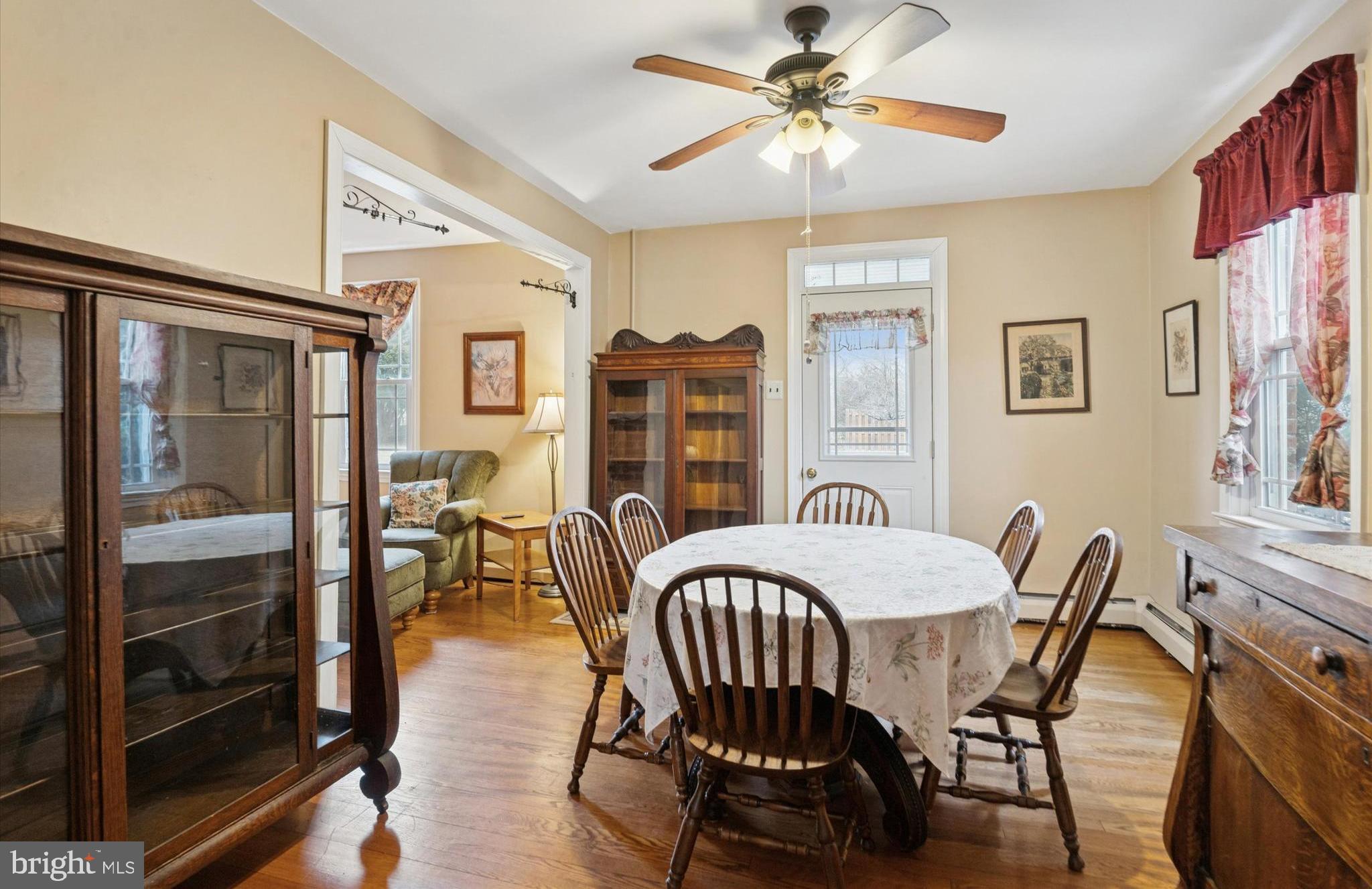 613 Convent Road Aston, PA 19014 - Photo 8 of 25 a view of a dining room with furniture window and wooden floor