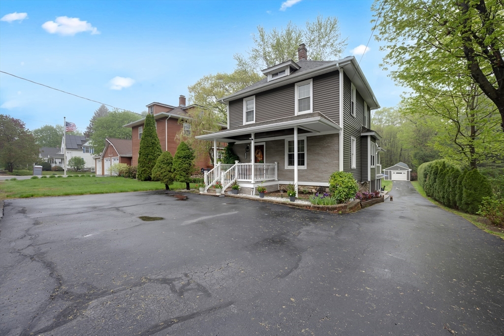 156 Olean Street Worcester, MA 01602 - Photo 2 of 37 a view of a house with a yard